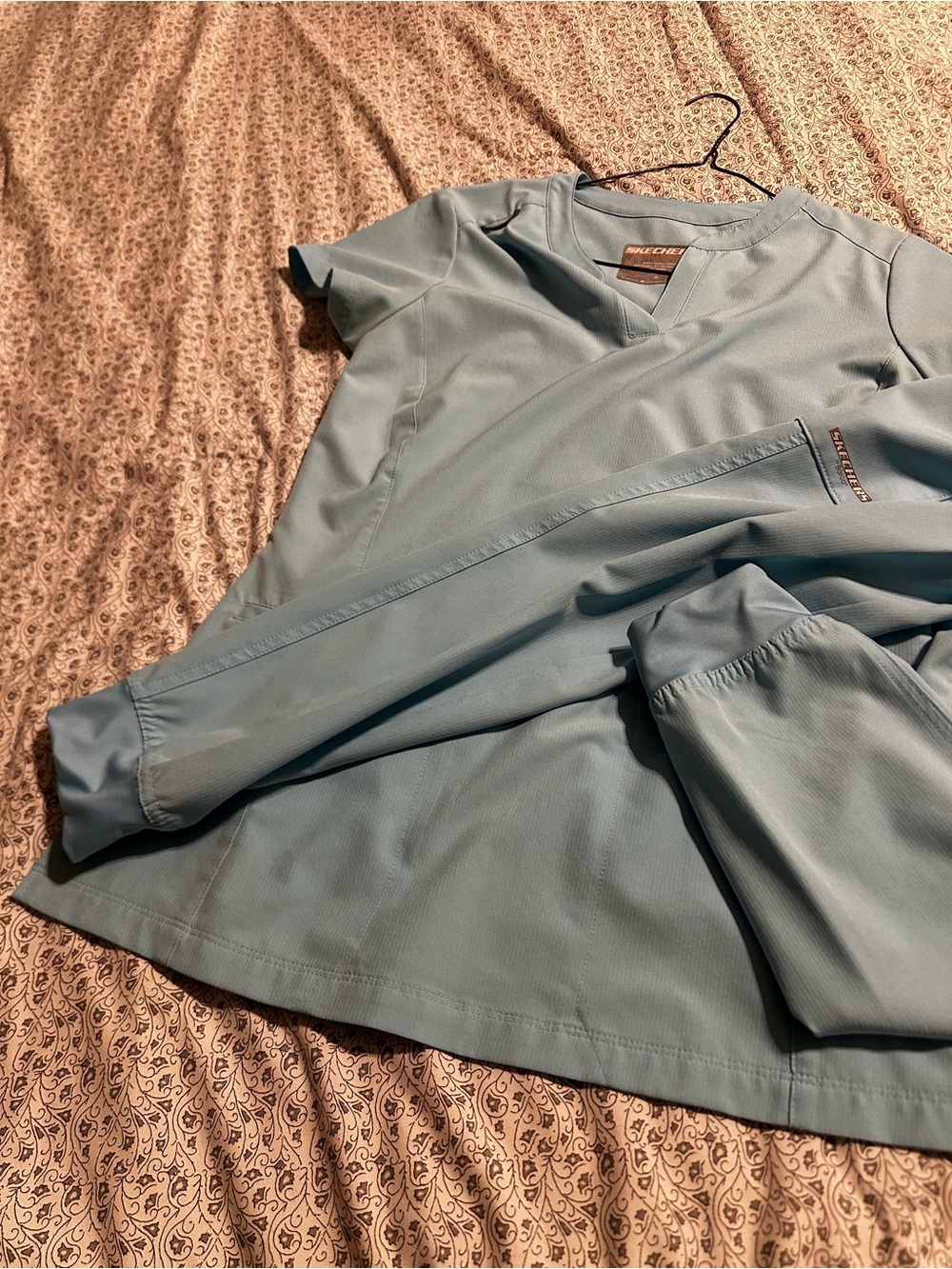 Skechers women’s scrub set.